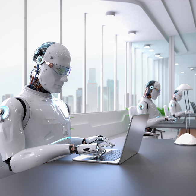 A row of humanoid robots encodes AI's growing impact as they sit at a modern office setup, each working on laptops. The bright, glass-walled room overlooks a bustling cityscape. With sleek designs and visible mechanical joints with blue accents, these robots epitomize innovation.