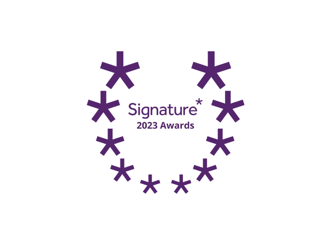 A purple wreath-like circle of asterisks gracefully encircles the elegant "Signature 2023 Awards" text against a pristine white background.
